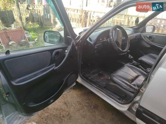 Серый Шевроле Нива, объемом двигателя 1.69 л и пробегом 1 тыс. км за 3200 $, фото 6 на Automoto.ua