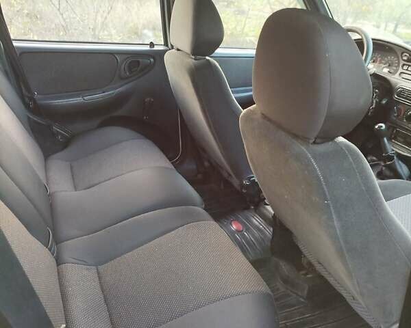 Сірий Шевроле Нива, об'ємом двигуна 1.7 л та пробігом 130 тис. км за 5500 $, фото 2 на Automoto.ua