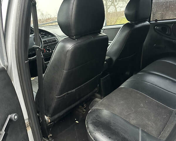 Серый Шевроле Нива, объемом двигателя 1.69 л и пробегом 277 тыс. км за 5200 $, фото 9 на Automoto.ua