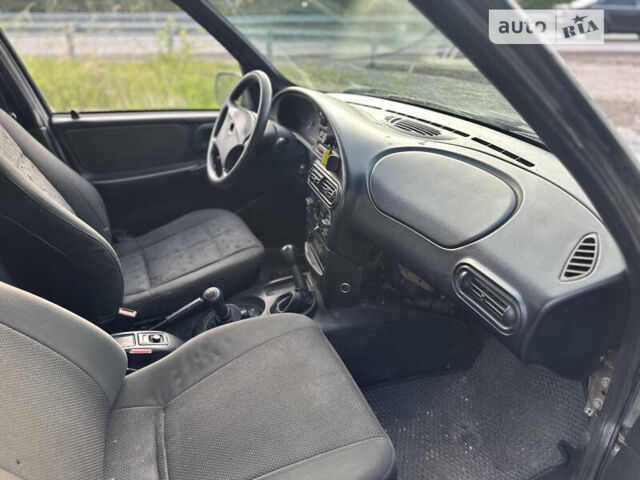 Серый Шевроле Нива, объемом двигателя 1.69 л и пробегом 195 тыс. км за 2400 $, фото 18 на Automoto.ua