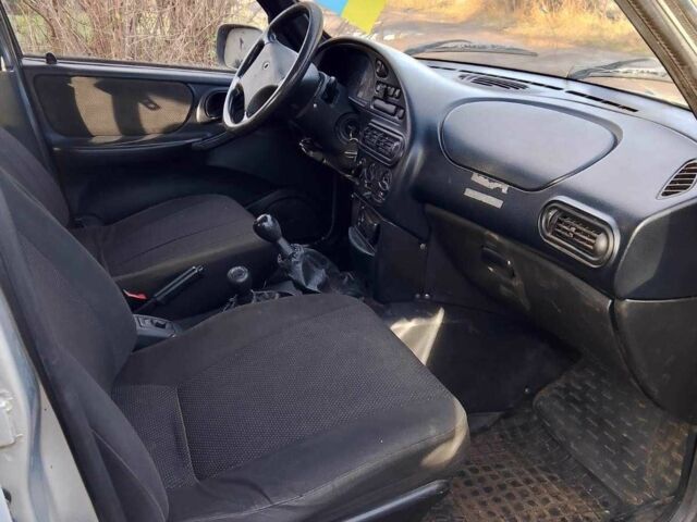 Сірий Шевроле Нива, об'ємом двигуна 1.7 л та пробігом 270 тис. км за 1900 $, фото 7 на Automoto.ua