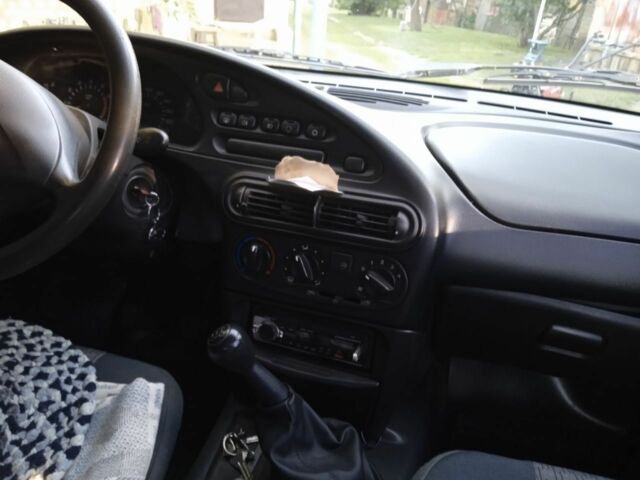 Серый Шевроле Нива, объемом двигателя 0 л и пробегом 210 тыс. км за 3500 $, фото 3 на Automoto.ua