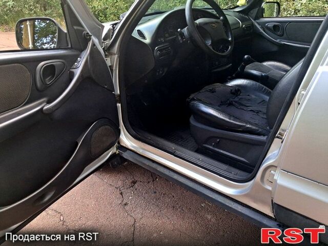 Сірий Шевроле Нива, об'ємом двигуна 1.7 л та пробігом 350 тис. км за 3300 $, фото 6 на Automoto.ua