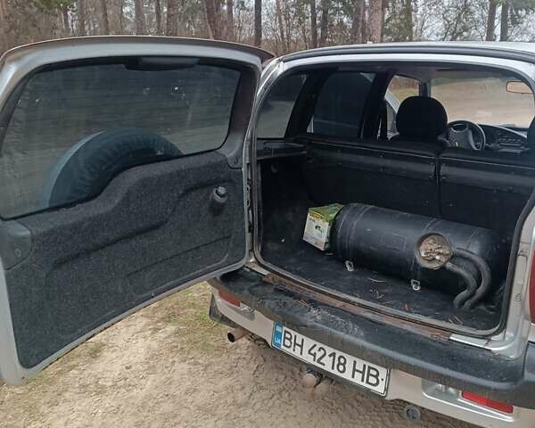 Серый Шевроле Нива, объемом двигателя 1.7 л и пробегом 193 тыс. км за 3000 $, фото 16 на Automoto.ua