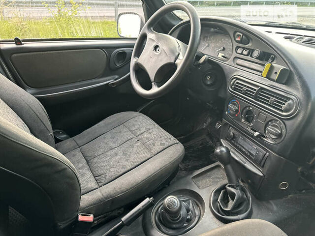 Серый Шевроле Нива, объемом двигателя 1.69 л и пробегом 195 тыс. км за 2400 $, фото 17 на Automoto.ua