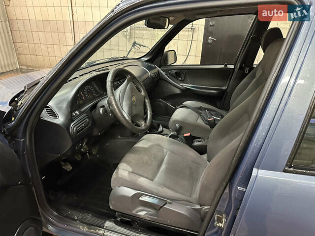 Сірий Шевроле Нива, об'ємом двигуна 1.69 л та пробігом 401 тис. км за 4600 $, фото 9 на Automoto.ua