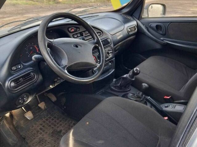 Сірий Шевроле Нива, об'ємом двигуна 1.7 л та пробігом 270 тис. км за 1900 $, фото 6 на Automoto.ua