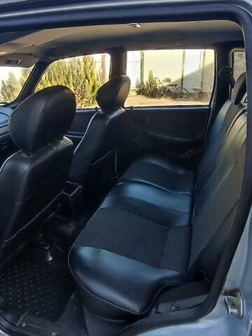 Серый Шевроле Нива, объемом двигателя 1.69 л и пробегом 140 тыс. км за 5500 $, фото 7 на Automoto.ua