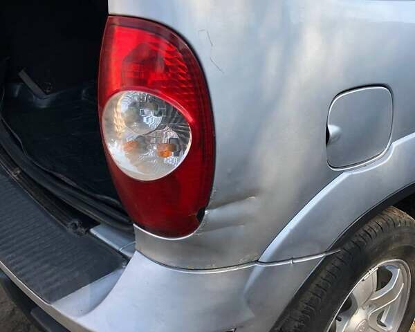 Серый Шевроле Нива, объемом двигателя 1.7 л и пробегом 250 тыс. км за 4500 $, фото 5 на Automoto.ua