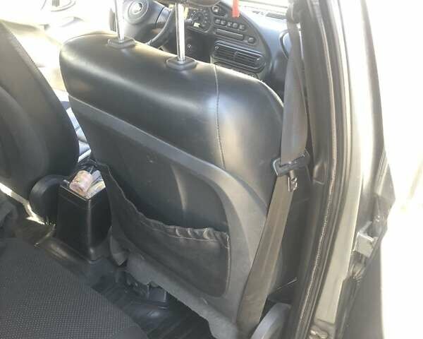 Серый Шевроле Нива, объемом двигателя 1.7 л и пробегом 74 тыс. км за 5500 $, фото 7 на Automoto.ua