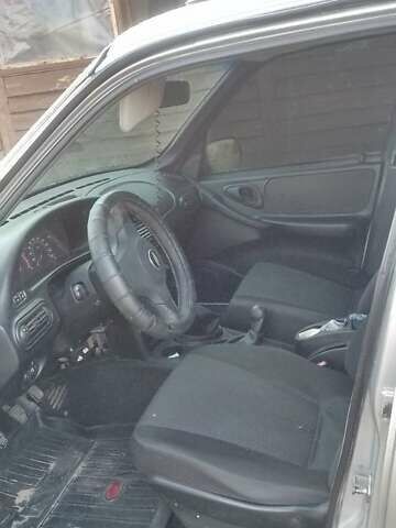 Серый Шевроле Нива, объемом двигателя 1.69 л и пробегом 155 тыс. км за 5200 $, фото 7 на Automoto.ua