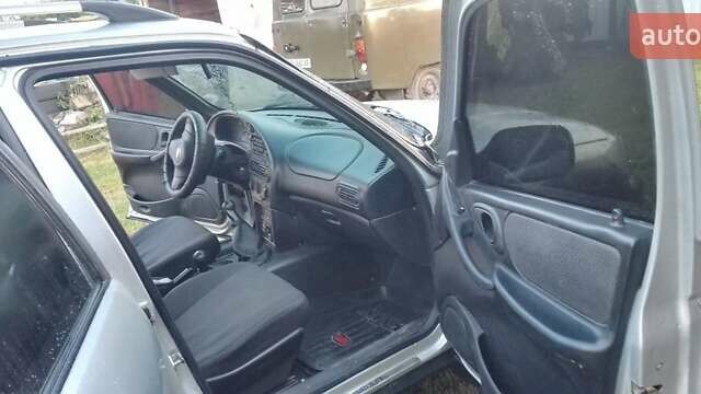Серый Шевроле Нива, объемом двигателя 1.69 л и пробегом 155 тыс. км за 5200 $, фото 10 на Automoto.ua