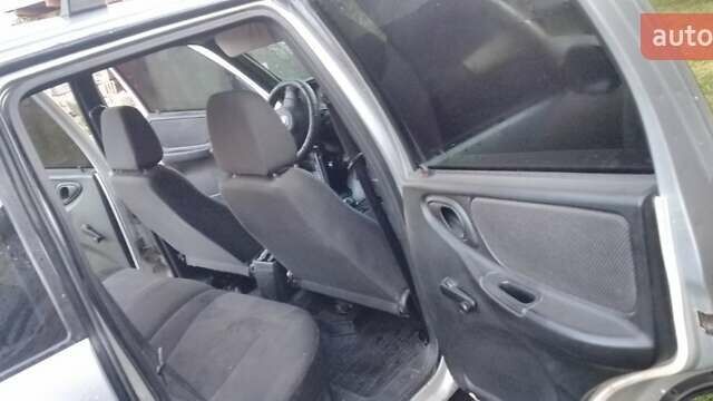 Серый Шевроле Нива, объемом двигателя 1.69 л и пробегом 155 тыс. км за 5200 $, фото 6 на Automoto.ua