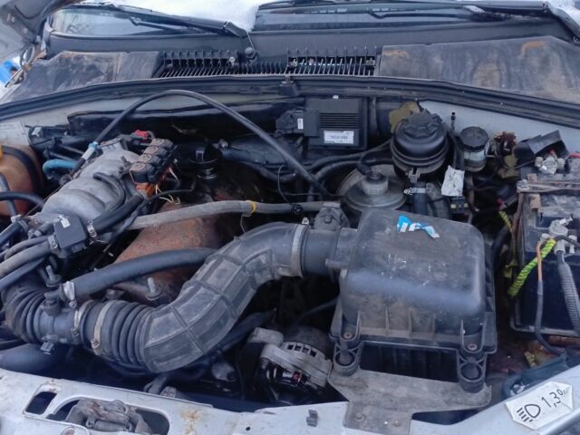 Серый Шевроле Нива, объемом двигателя 1.7 л и пробегом 500 тыс. км за 3500 $, фото 7 на Automoto.ua