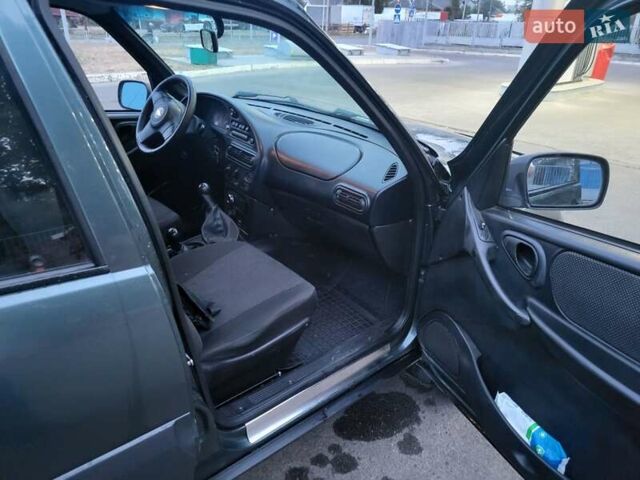 Сірий Шевроле Нива, об'ємом двигуна 1.69 л та пробігом 138 тис. км за 5000 $, фото 8 на Automoto.ua