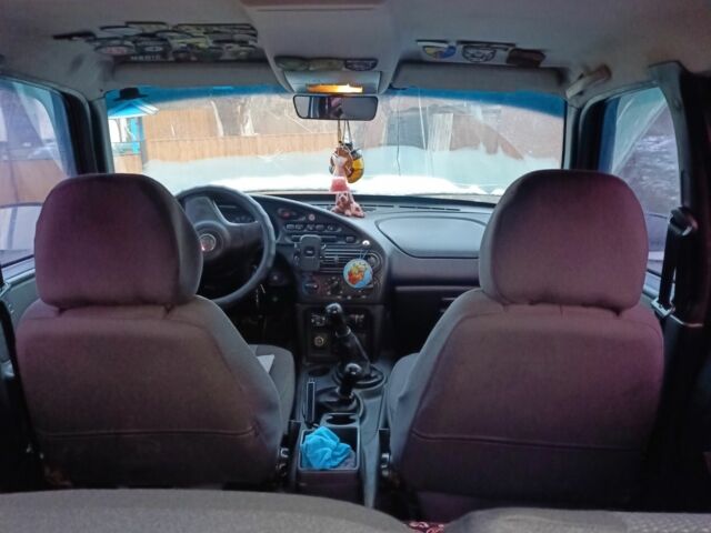 Серый Шевроле Нива, объемом двигателя 1.7 л и пробегом 500 тыс. км за 3500 $, фото 2 на Automoto.ua