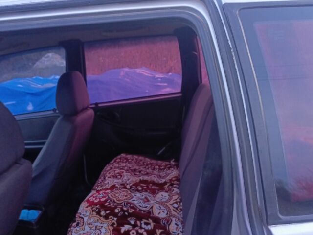 Серый Шевроле Нива, объемом двигателя 1.7 л и пробегом 500 тыс. км за 3500 $, фото 1 на Automoto.ua