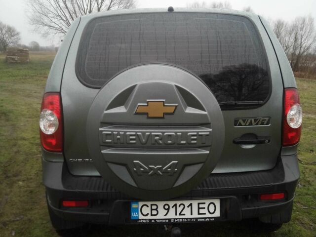 Серый Шевроле Нива, объемом двигателя 1.7 л и пробегом 157 тыс. км за 5500 $, фото 4 на Automoto.ua