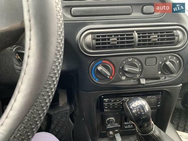 Серый Шевроле Нива, объемом двигателя 1.69 л и пробегом 188 тыс. км за 5700 $, фото 9 на Automoto.ua
