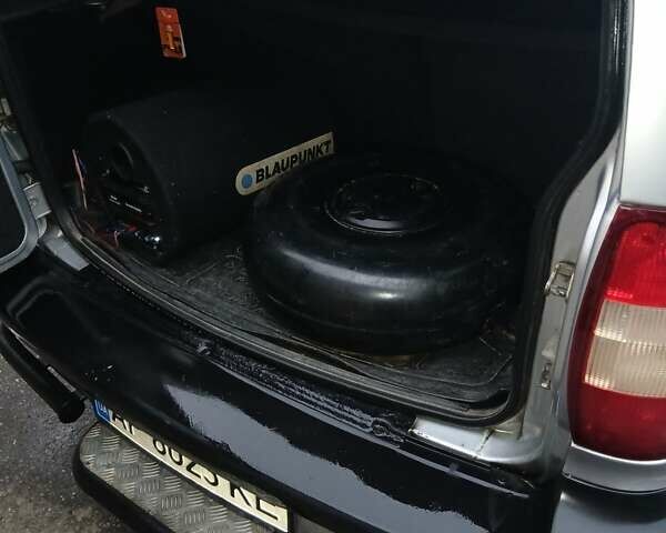 Серый Шевроле Нива, объемом двигателя 1.7 л и пробегом 210 тыс. км за 3500 $, фото 5 на Automoto.ua