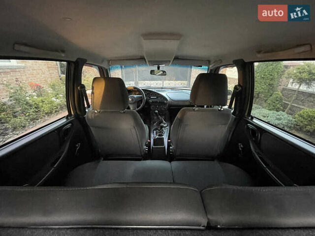 Серый Шевроле Нива, объемом двигателя 1.69 л и пробегом 125 тыс. км за 7500 $, фото 25 на Automoto.ua