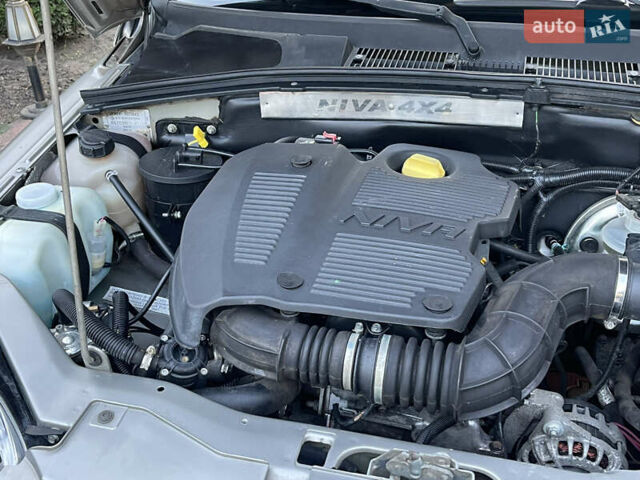Серый Шевроле Нива, объемом двигателя 1.69 л и пробегом 125 тыс. км за 8500 $, фото 38 на Automoto.ua