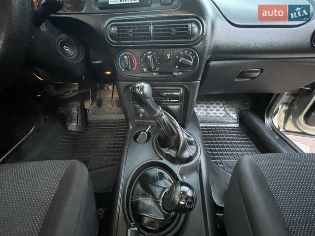 Серый Шевроле Нива, объемом двигателя 1.69 л и пробегом 125 тыс. км за 7500 $, фото 27 на Automoto.ua