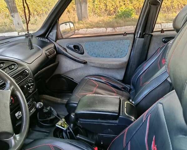 Синій Шевроле Нива, об'ємом двигуна 1.7 л та пробігом 255 тис. км за 3336 $, фото 5 на Automoto.ua