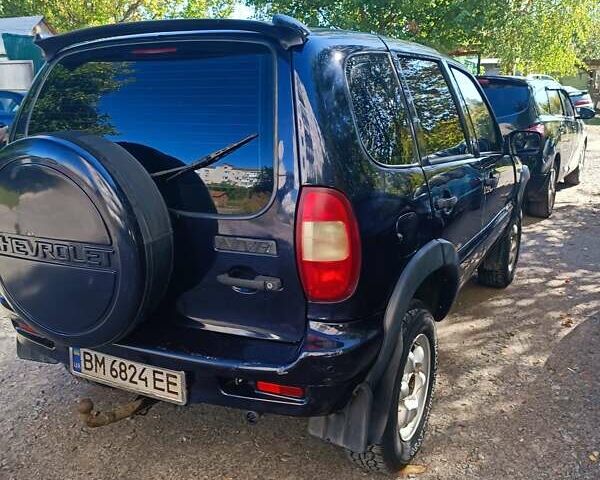 Синий Шевроле Нива, объемом двигателя 1.69 л и пробегом 225 тыс. км за 3800 $, фото 2 на Automoto.ua