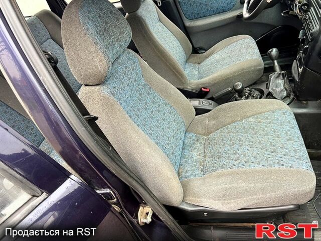 Синий Шевроле Нива, объемом двигателя 1.7 л и пробегом 170 тыс. км за 2450 $, фото 7 на Automoto.ua