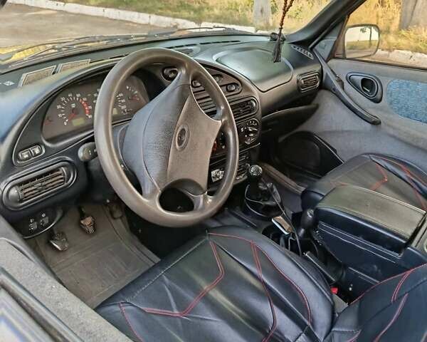 Синій Шевроле Нива, об'ємом двигуна 1.7 л та пробігом 255 тис. км за 3336 $, фото 6 на Automoto.ua