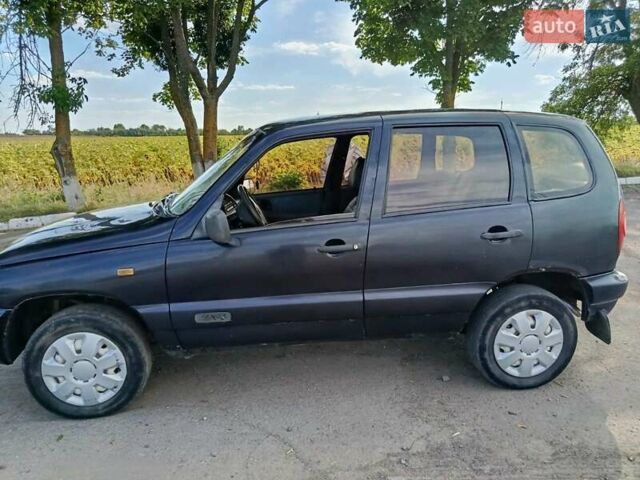 Синій Шевроле Нива, об'ємом двигуна 1.7 л та пробігом 255 тис. км за 3336 $, фото 4 на Automoto.ua