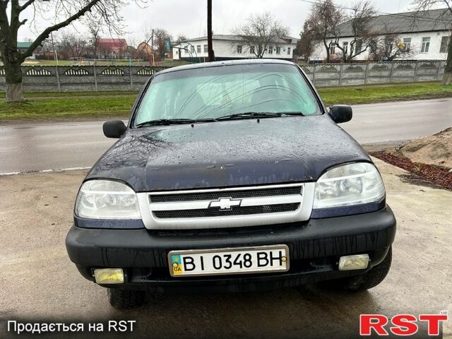 Синий Шевроле Нива, объемом двигателя 1.7 л и пробегом 170 тыс. км за 2450 $, фото 1 на Automoto.ua