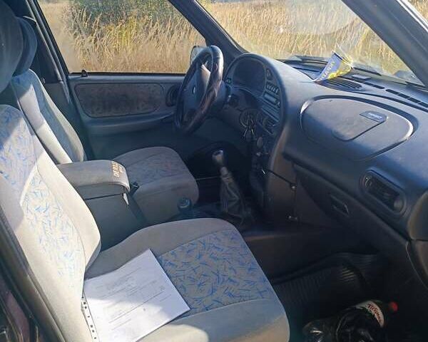 Синий Шевроле Нива, объемом двигателя 1.69 л и пробегом 225 тыс. км за 3800 $, фото 3 на Automoto.ua
