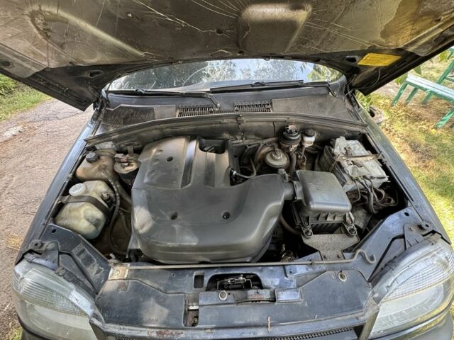 Синий Шевроле Нива, объемом двигателя 1.7 л и пробегом 230 тыс. км за 1850 $, фото 3 на Automoto.ua