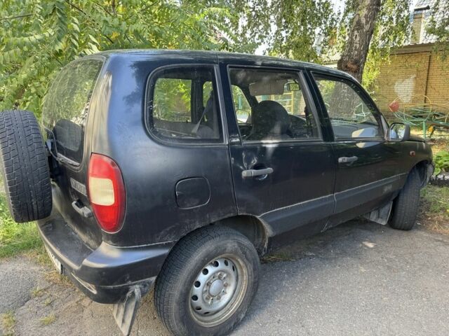 Синий Шевроле Нива, объемом двигателя 1.7 л и пробегом 230 тыс. км за 1850 $, фото 1 на Automoto.ua