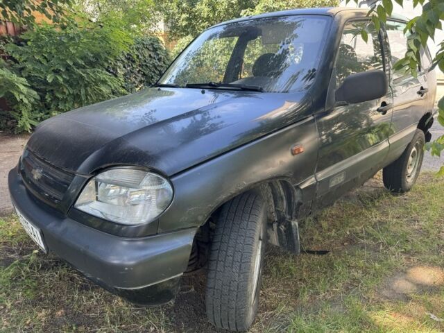 Синий Шевроле Нива, объемом двигателя 1.7 л и пробегом 230 тыс. км за 1850 $, фото 2 на Automoto.ua