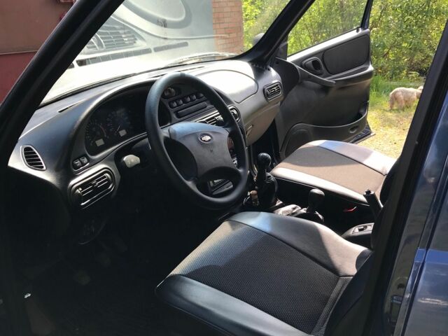 Синий Шевроле Нива, объемом двигателя 1.7 л и пробегом 35 тыс. км за 5000 $, фото 3 на Automoto.ua