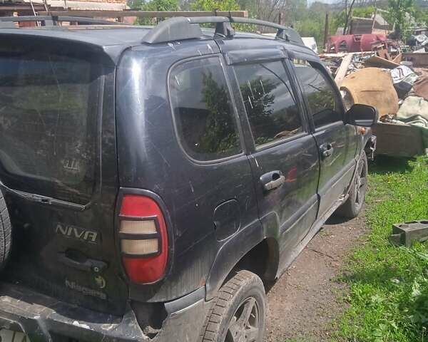 Синий Шевроле Нива, объемом двигателя 1.7 л и пробегом 179 тыс. км за 3200 $, фото 4 на Automoto.ua