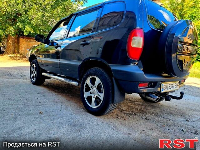 Синий Шевроле Нива, объемом двигателя 1.7 л и пробегом 282 тыс. км за 3999 $, фото 5 на Automoto.ua