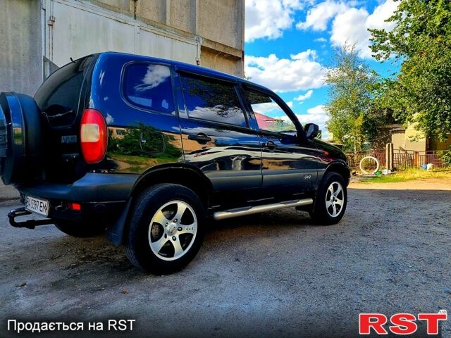 Синий Шевроле Нива, объемом двигателя 1.7 л и пробегом 282 тыс. км за 3999 $, фото 3 на Automoto.ua