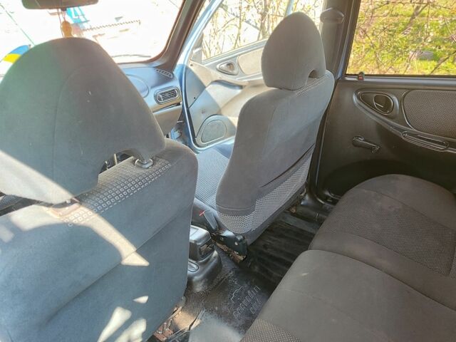 Синий Шевроле Нива, объемом двигателя 1.7 л и пробегом 196 тыс. км за 1200 $, фото 7 на Automoto.ua