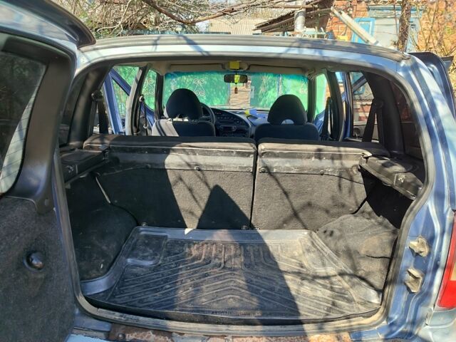 Синий Шевроле Нива, объемом двигателя 1.7 л и пробегом 196 тыс. км за 1200 $, фото 5 на Automoto.ua
