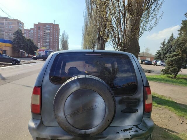 Синий Шевроле Нива, объемом двигателя 1.7 л и пробегом 196 тыс. км за 1200 $, фото 4 на Automoto.ua