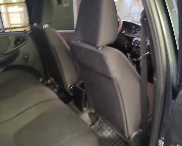 Синий Шевроле Нива, объемом двигателя 1.69 л и пробегом 90 тыс. км за 8800 $, фото 5 на Automoto.ua