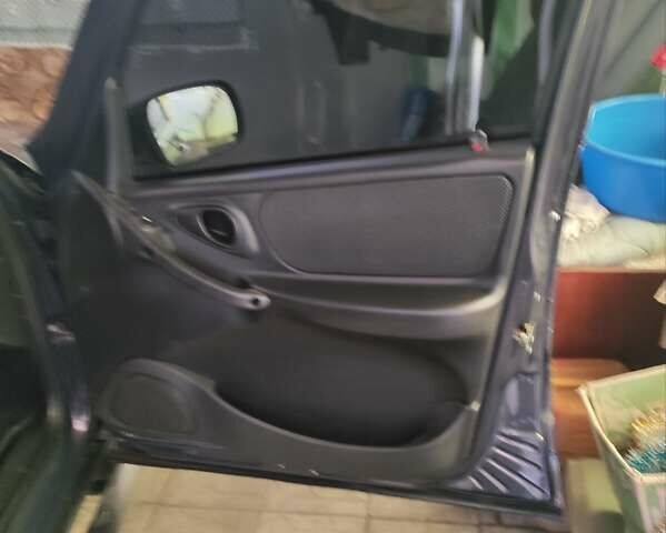 Синий Шевроле Нива, объемом двигателя 1.69 л и пробегом 90 тыс. км за 8800 $, фото 2 на Automoto.ua