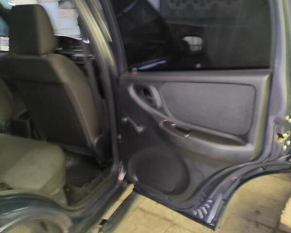 Синий Шевроле Нива, объемом двигателя 1.69 л и пробегом 90 тыс. км за 8800 $, фото 4 на Automoto.ua