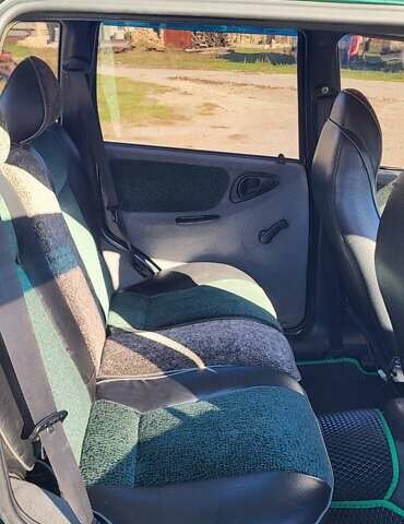 Зелений Шевроле Нива, об'ємом двигуна 1.69 л та пробігом 116 тис. км за 4600 $, фото 7 на Automoto.ua