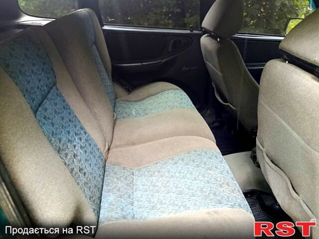 Зелений Шевроле Нива, об'ємом двигуна 1.7 л та пробігом 160 тис. км за 3500 $, фото 5 на Automoto.ua