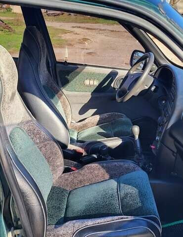 Зелений Шевроле Нива, об'ємом двигуна 1.69 л та пробігом 116 тис. км за 4600 $, фото 6 на Automoto.ua